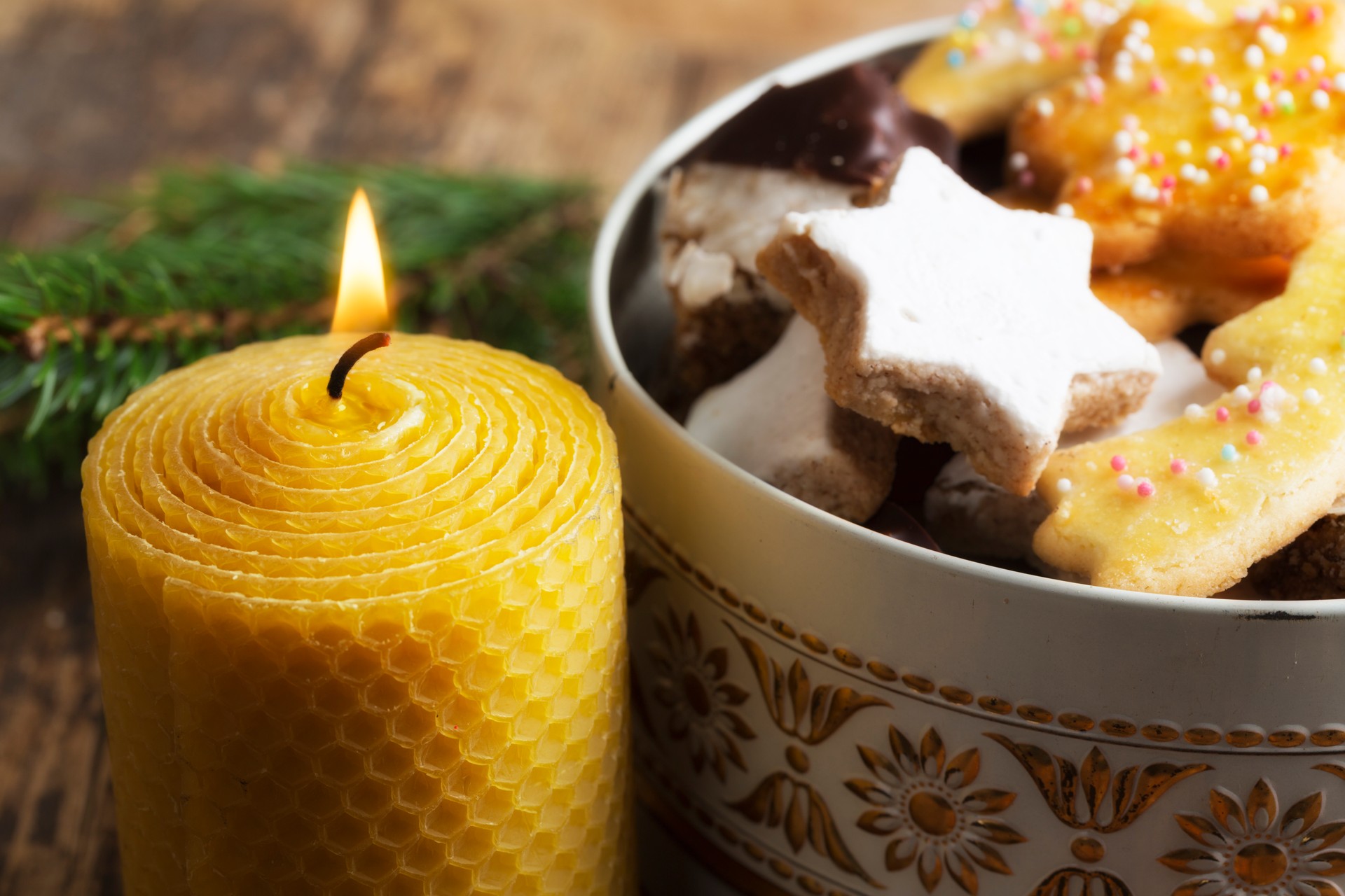 christmas cookies in box and burning honey beeswax candle christmas cookies in box and burning honey beeswax candle